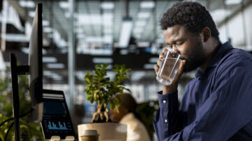 Laboratory technician performing water quality analysis to test for contaminants and ensure safe drinking water standards.